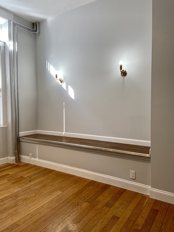 83 West Cedar Street, Unit 1 Boston, MA 02114 - Photo 9 of 15 a bathroom with a bathtub and a shower