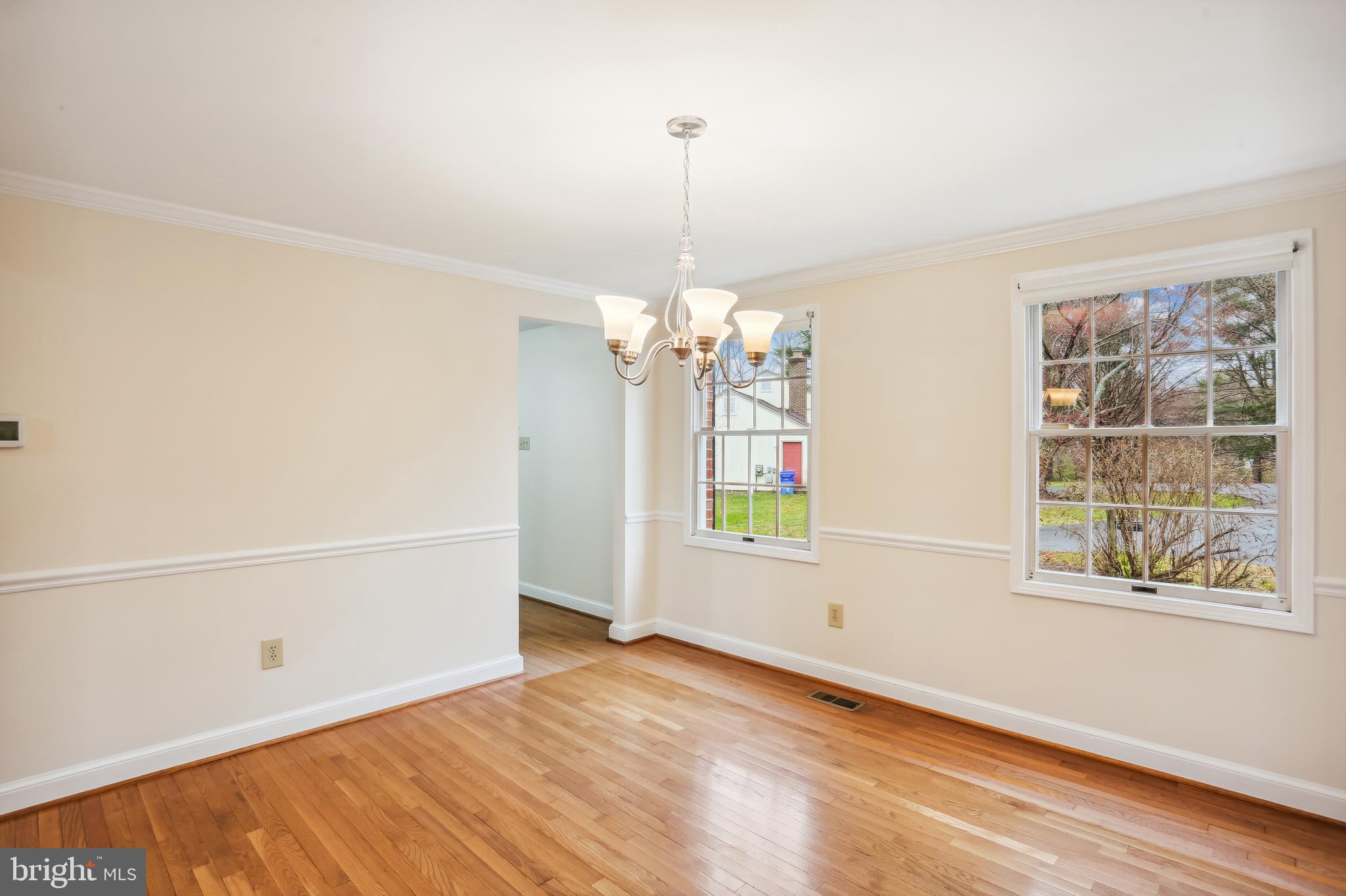 9730 Wightman Road Gaithersburg, MD 20882 - Photo 5 of 64 Formal dining room opens into the foyer.