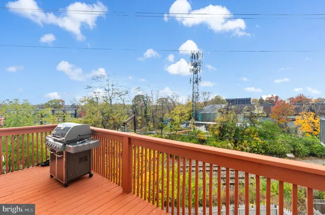 a view of balcony with furniture