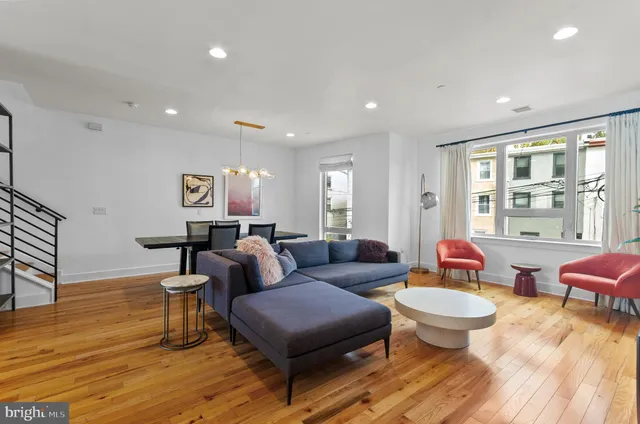 a living room with furniture and window