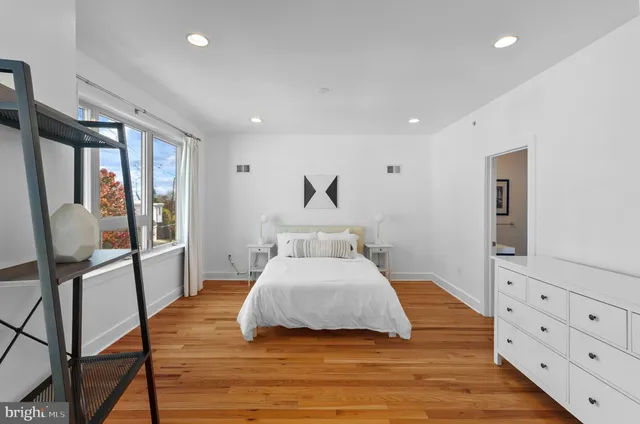 a bathroom with a shower and a sink