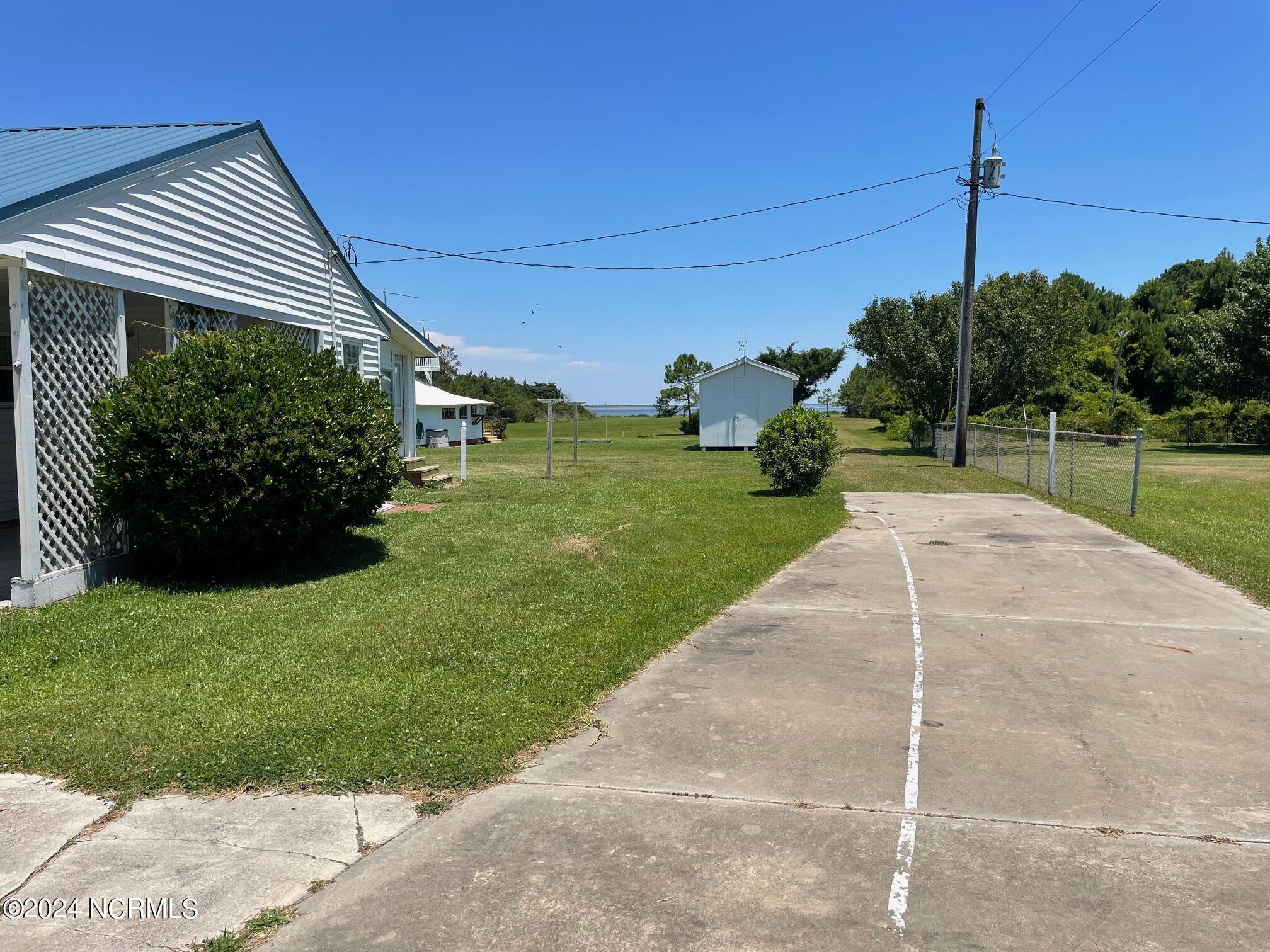 2604 Cedar Island Road Cedar Island, NC 28520 - Photo 11 of 62 Concrete driveway
