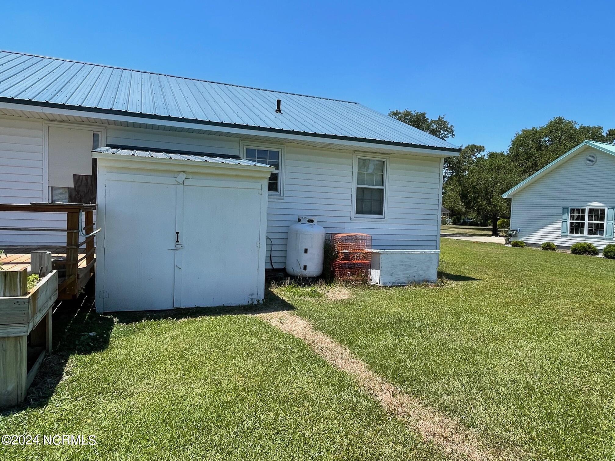 2604 Cedar Island Road Cedar Island, NC 28520 - Photo 21 of 62 rear of house
