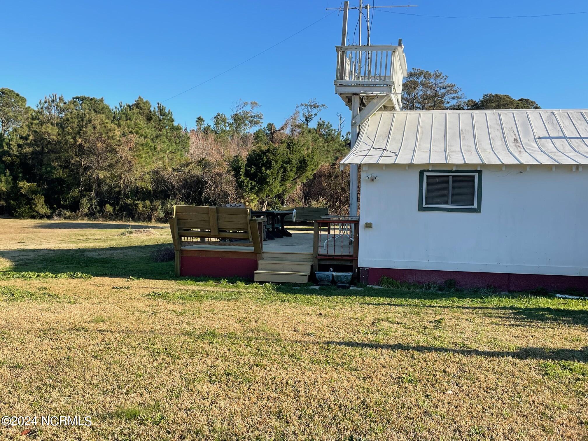 2604 Cedar Island Road Cedar Island, NC 28520 - Photo 46 of 62 Side of Studio/Barn
