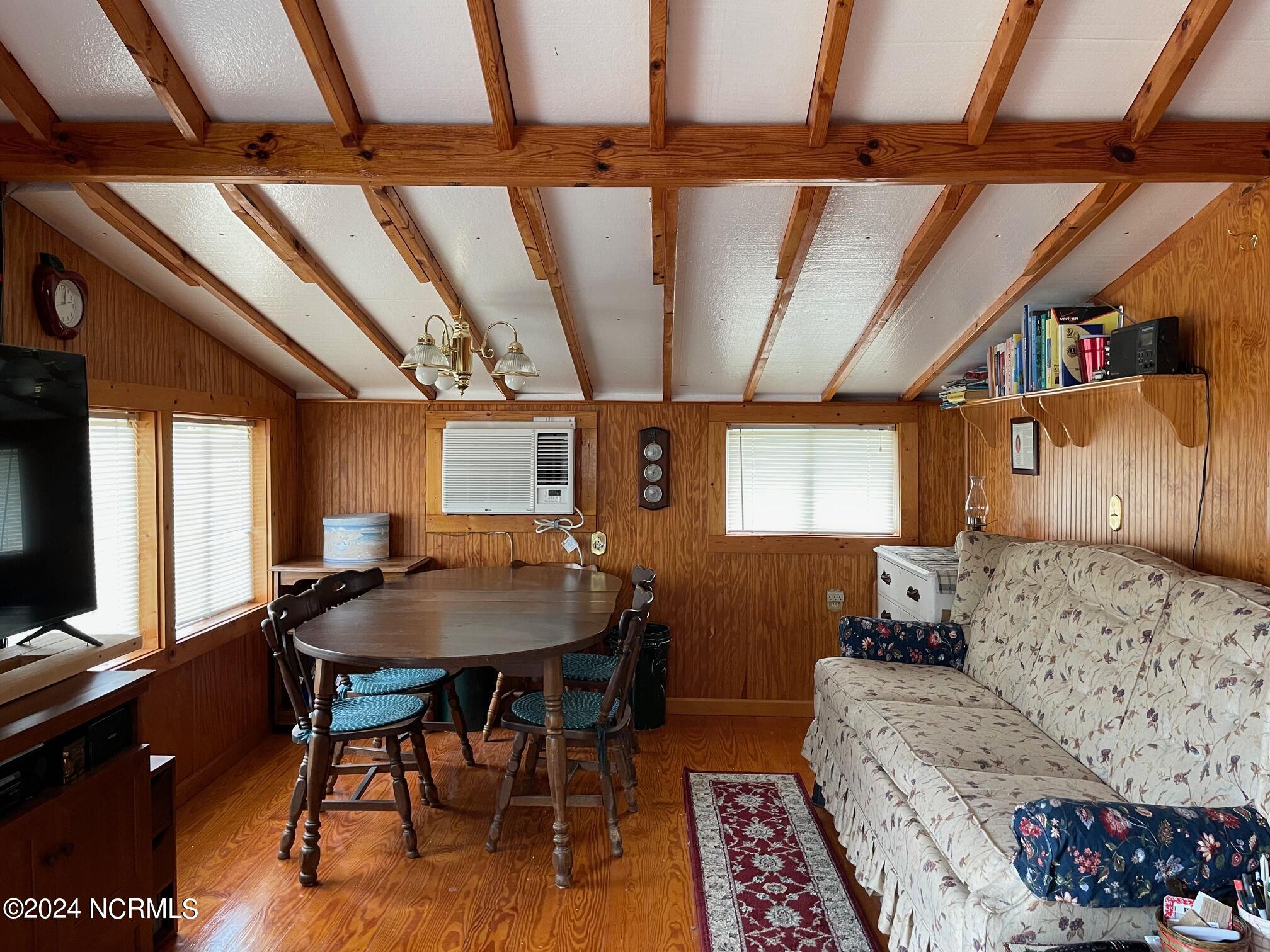 2604 Cedar Island Road Cedar Island, NC 28520 - Photo 51 of 62 Living Rm with sofa and table with chairs