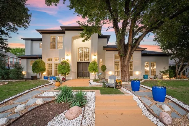 a view of a building with a yard