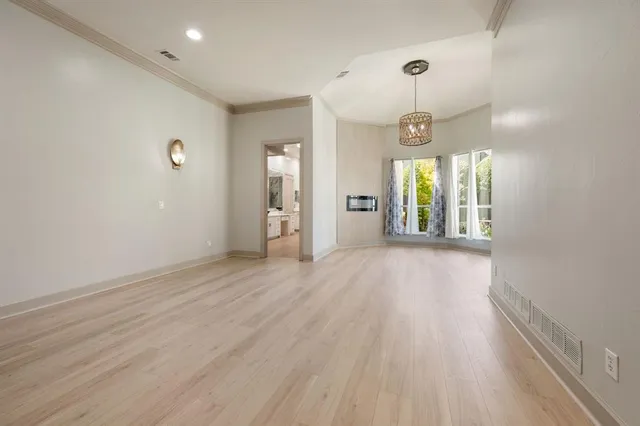 a bathroom with a toilet and a sink
