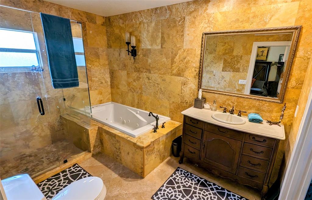 8105 Nutmeg Way Tamarac, FL 33321 - Photo 13 of 28 a bathroom with a sink and a mirror