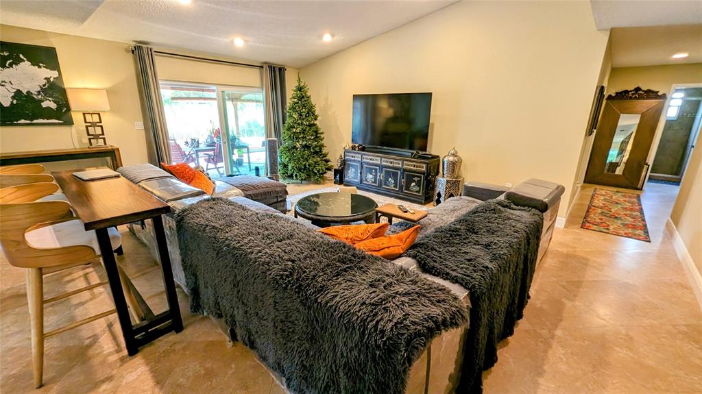 8105 Nutmeg Way Tamarac, FL 33321 - Photo 5 of 28 a living room with furniture and a flat screen tv