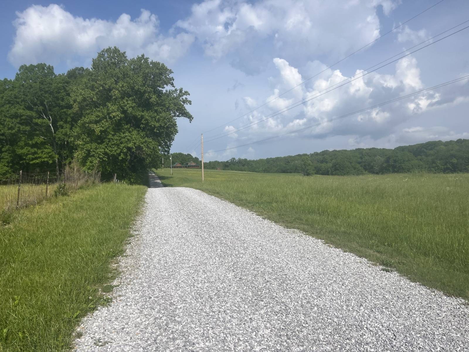 a view of a lake with a big yard