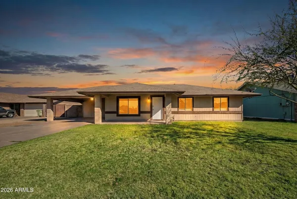 a front view of house with yard