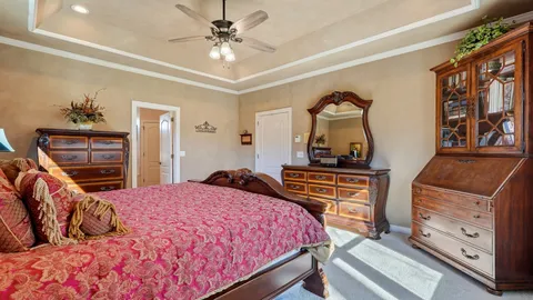 a bathroom with a tub a sink and a shower