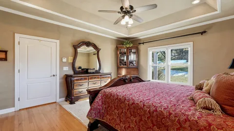 a en suite bathroom with a sink double vanity and a mirror