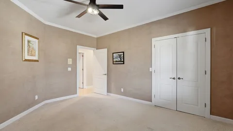 a bathroom with a shower and a sink