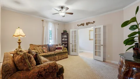 a living room with furniture and a couch
