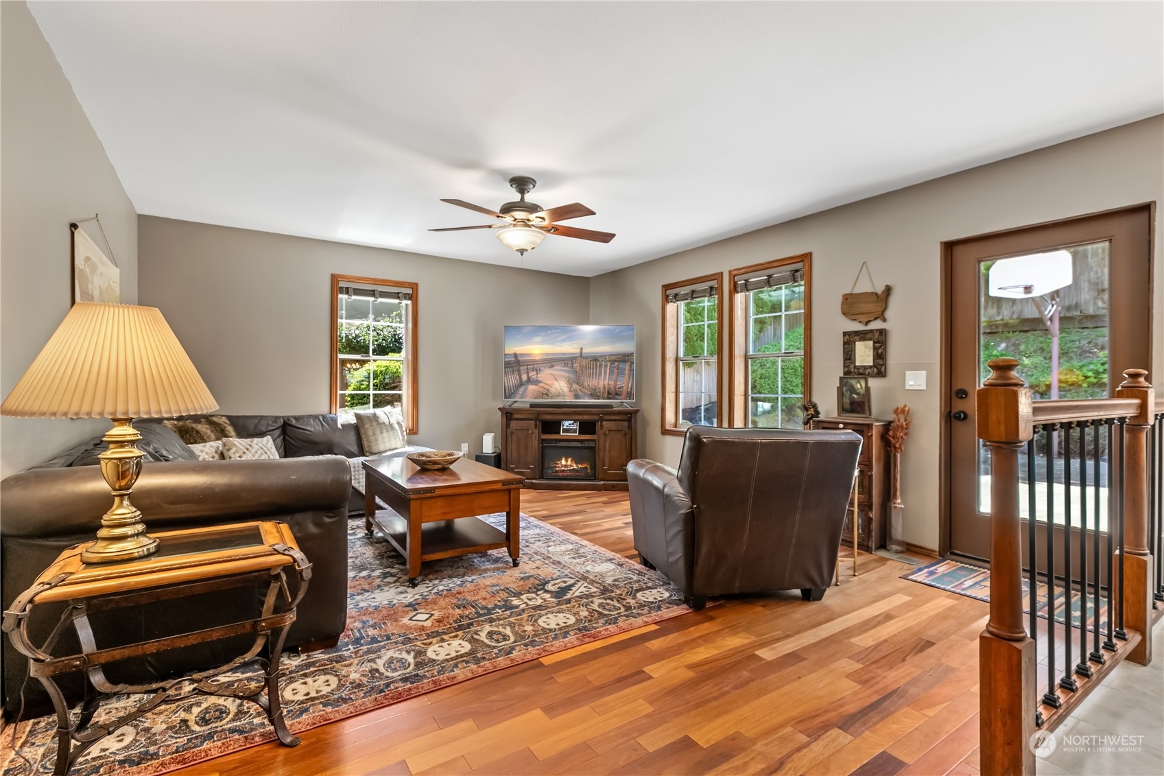24202 26th Avenue Southeast Bothell, WA 98021 - Photo 12 of 37 a living room with furniture and a window
