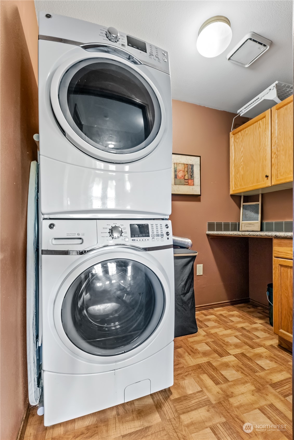 24202 26th Avenue Southeast Bothell, WA 98021 - Photo 23 of 37 a view of a kitchen with a washer and dryer