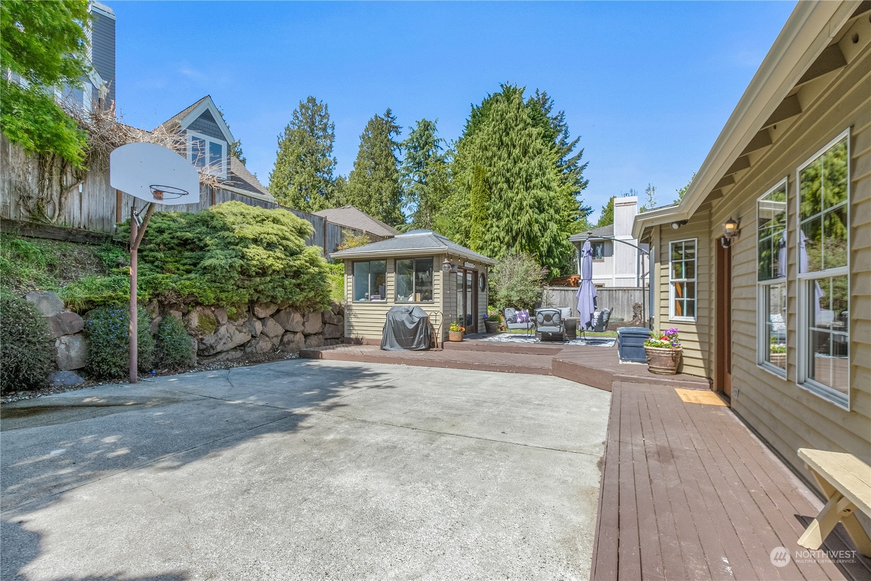 24202 26th Avenue Southeast Bothell, WA 98021 - Photo 26 of 37 a front view of a house with a yard and potted plants