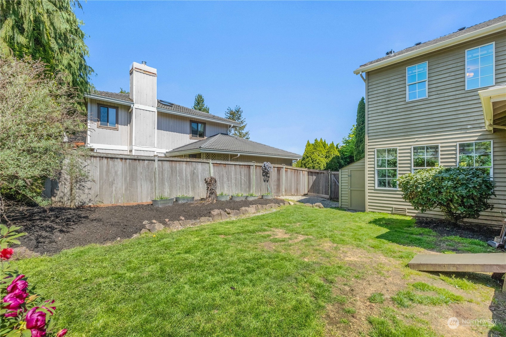 24202 26th Avenue Southeast Bothell, WA 98021 - Photo 28 of 37 a front view of a house with a yard and pathway