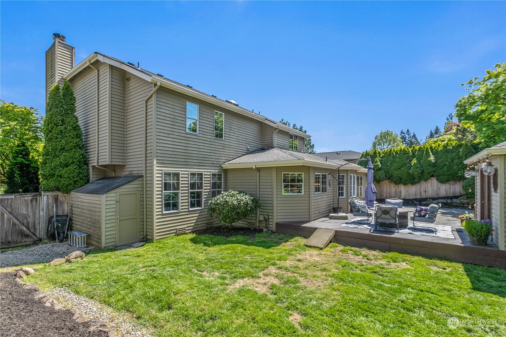 24202 26th Avenue Southeast Bothell, WA 98021 - Photo 29 of 37 a front view of a house with garden