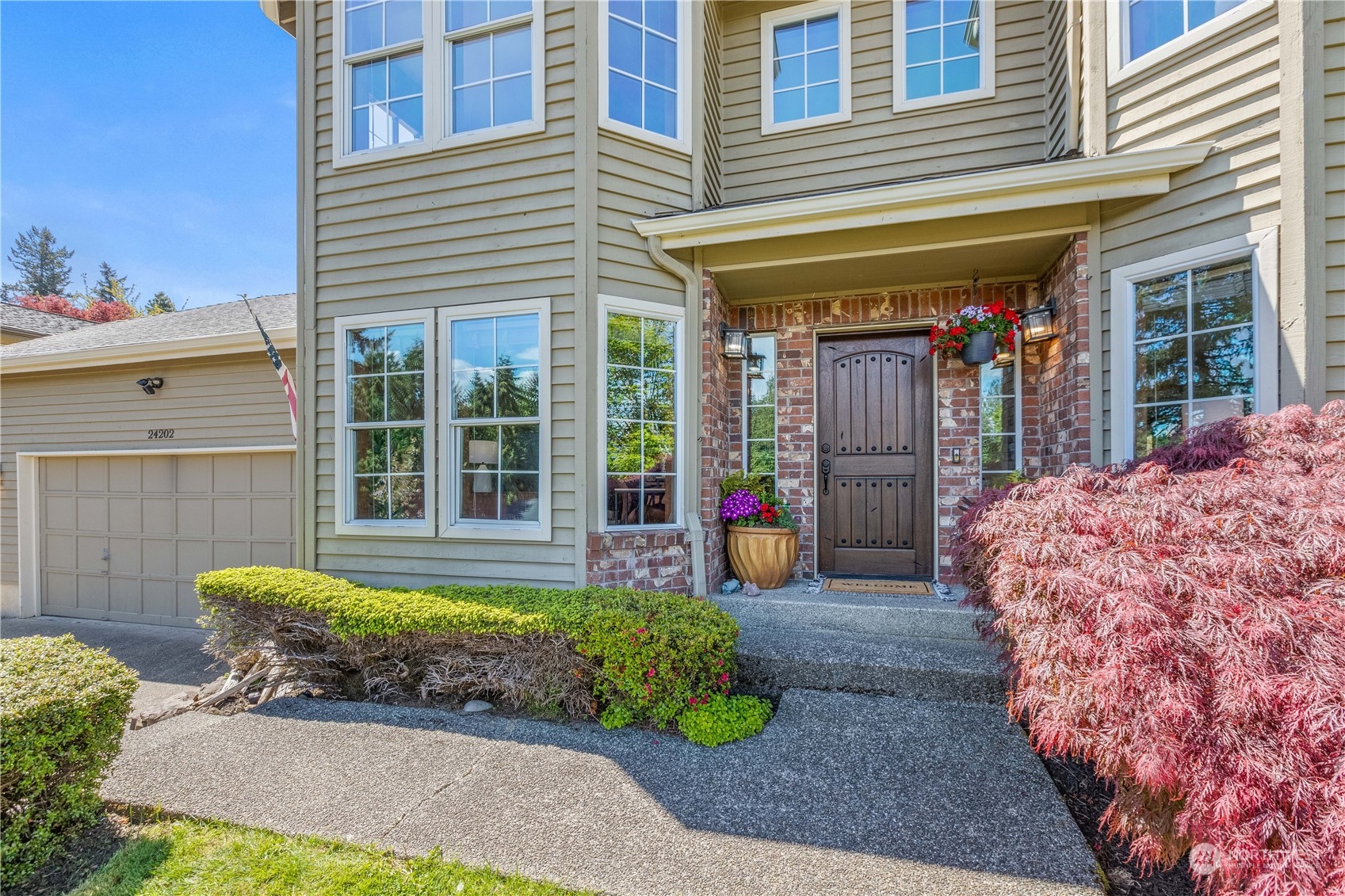 24202 26th Avenue Southeast Bothell, WA 98021 - Photo 3 of 37 a front view of a house