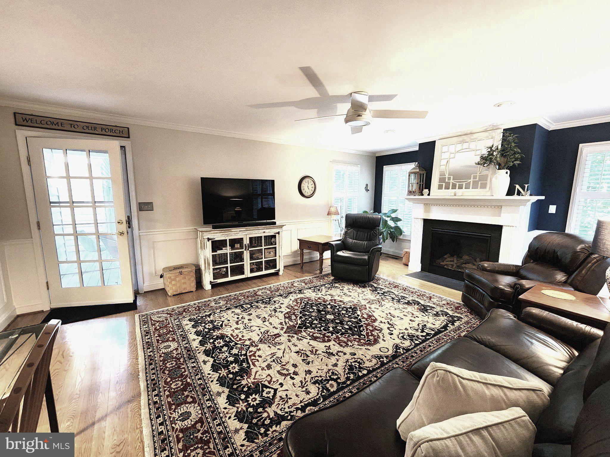 2829 Thornbrook Road Ellicott City, MD 21042 - Photo 11 of 34 Family room with door to deck