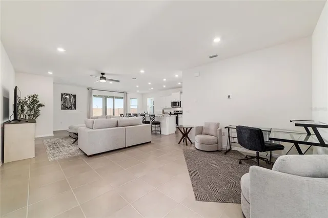 a living room with furniture and a couch