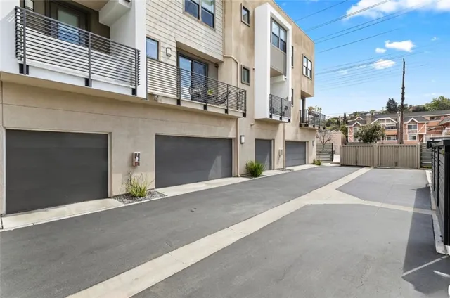 a front view of a building with a street