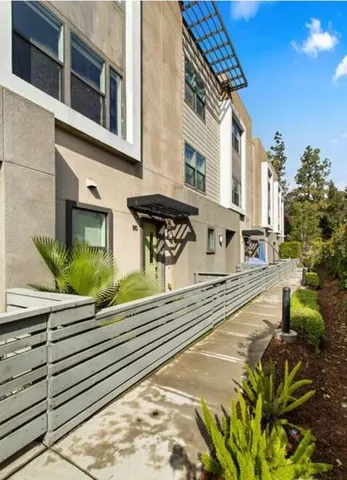 a street view with tall buildings