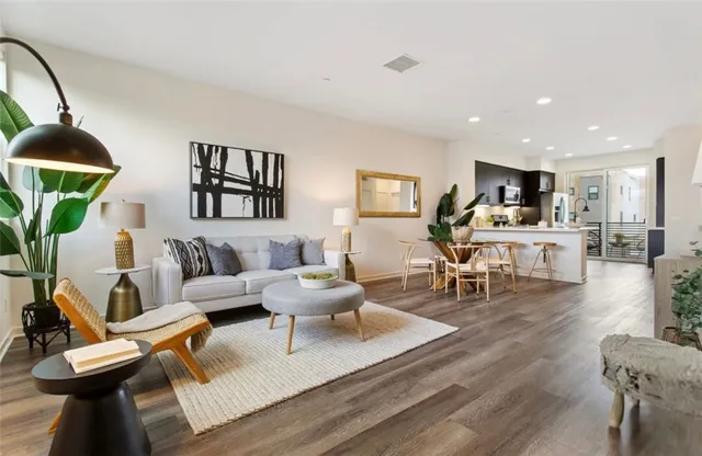 a living room with furniture and a table