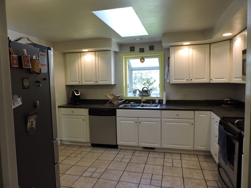 92 Lower Gore Road Webster, MA 01570 - Photo 19 of 42 a kitchen with a sink and cabinets