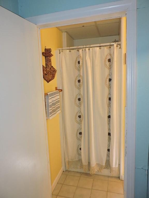 92 Lower Gore Road Webster, MA 01570 - Photo 34 of 42 a view of a bathroom with a shower and a sink