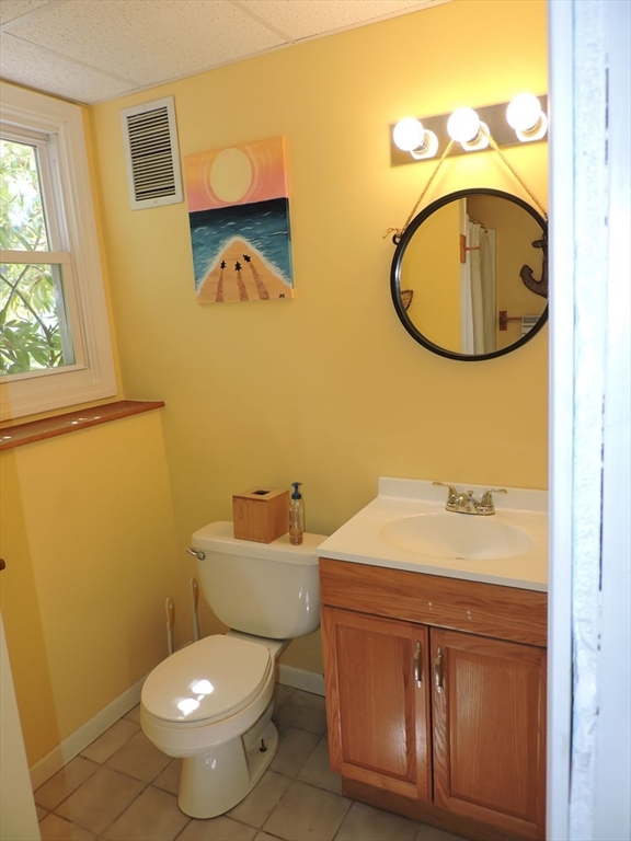 92 Lower Gore Road Webster, MA 01570 - Photo 35 of 42 a bathroom with a sink a mirror and a toilet