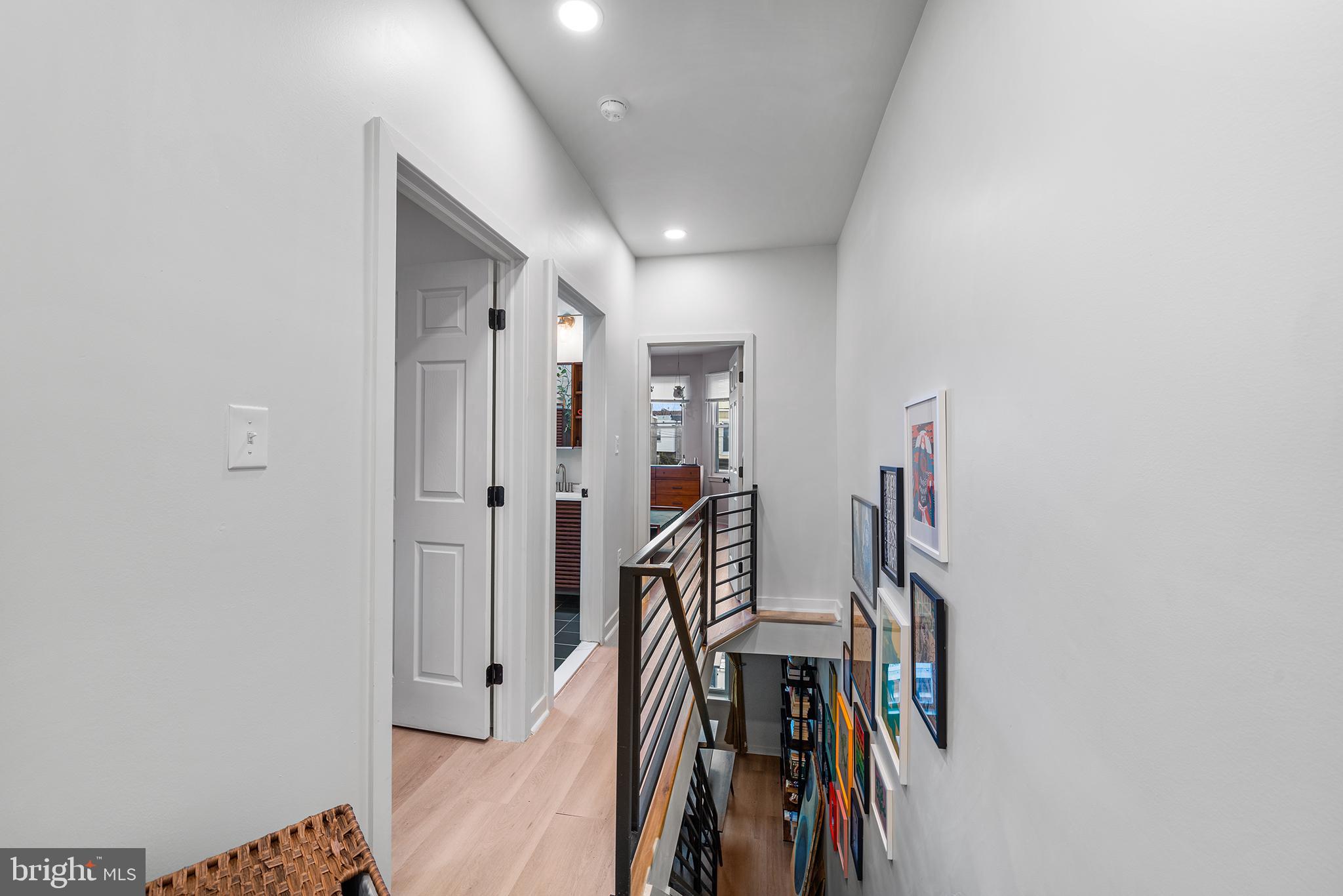 5426 Irving Street Philadelphia, PA 19139 - Photo 14 of 28 a view of a hallway with wooden floor and stairs