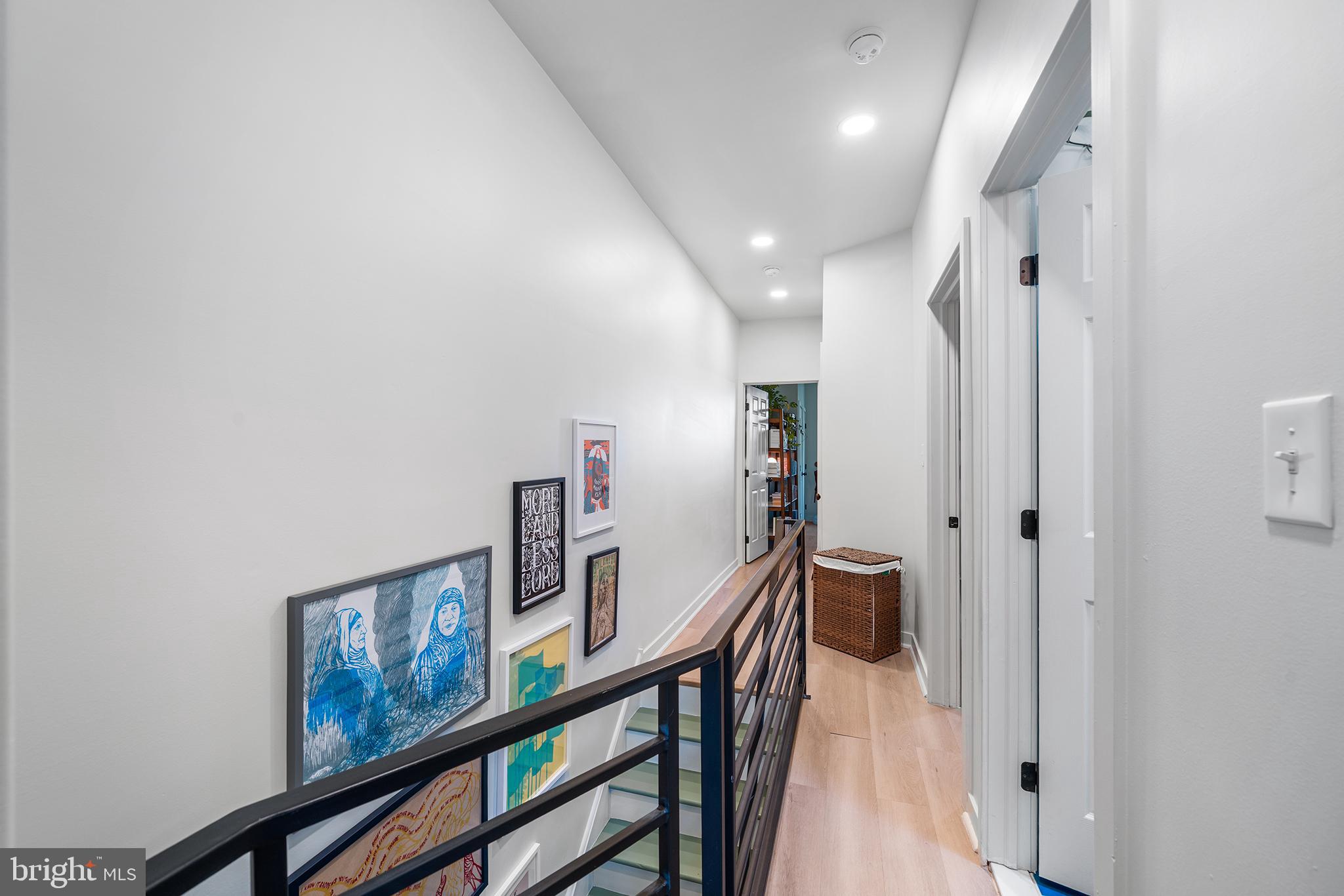 5426 Irving Street Philadelphia, PA 19139 - Photo 20 of 28 a view of a hallway with wooden floor and stairs