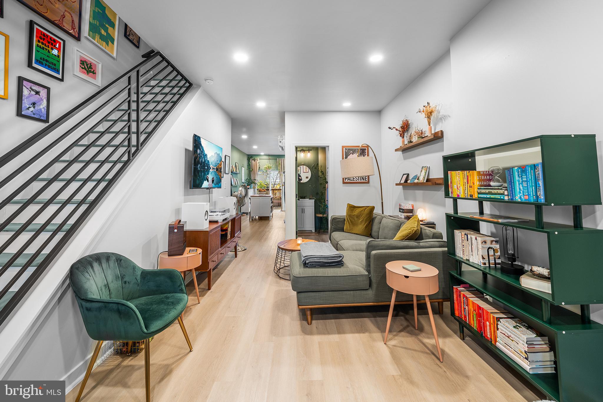 5426 Irving Street Philadelphia, PA 19139 - Photo 4 of 28 a living room with furniture and a flat screen tv