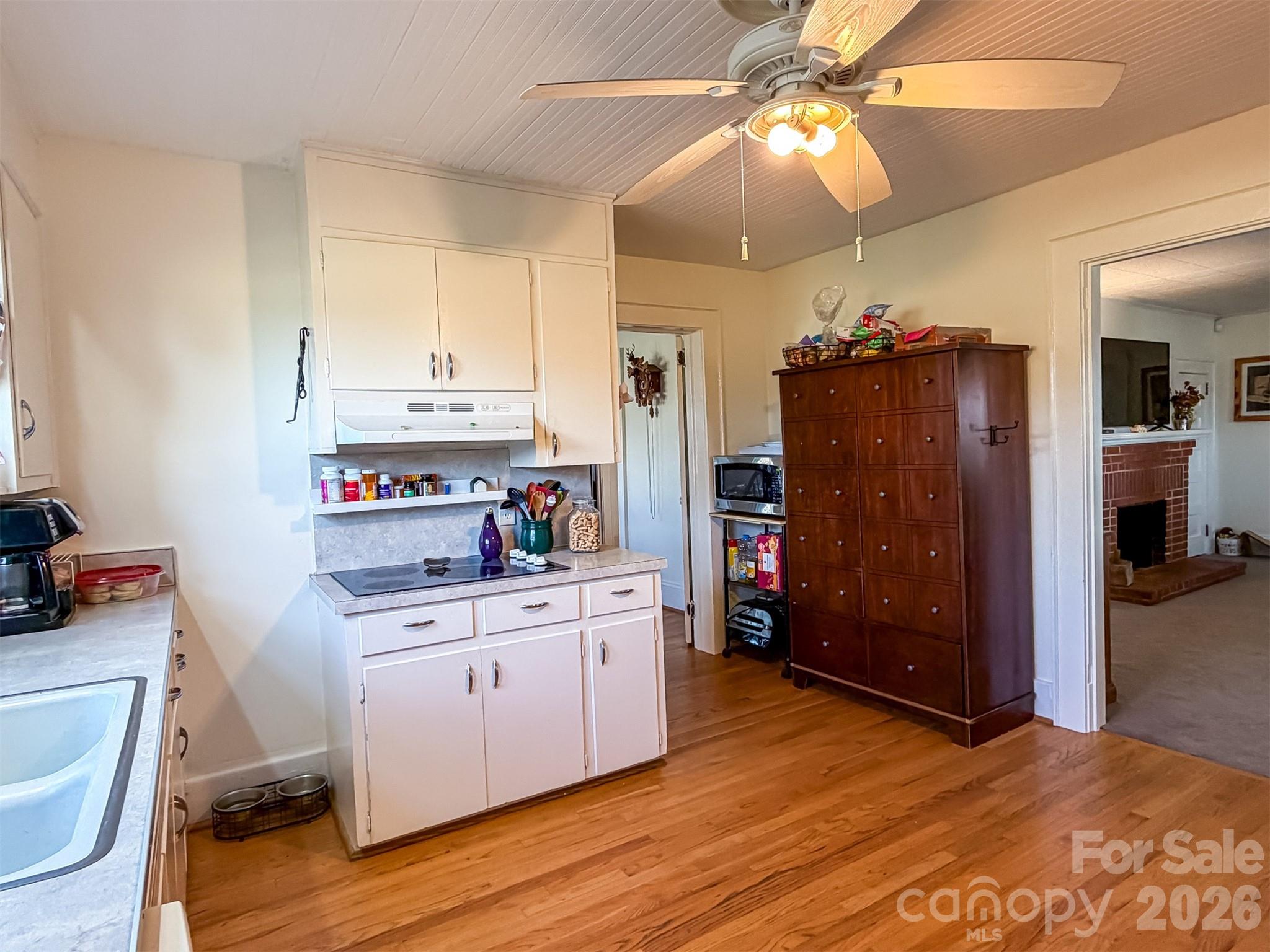 4363 Section House Road Hickory, NC 28601 - Photo 12 of 48 a kitchen that has a lot of cabinets in it and wooden floors