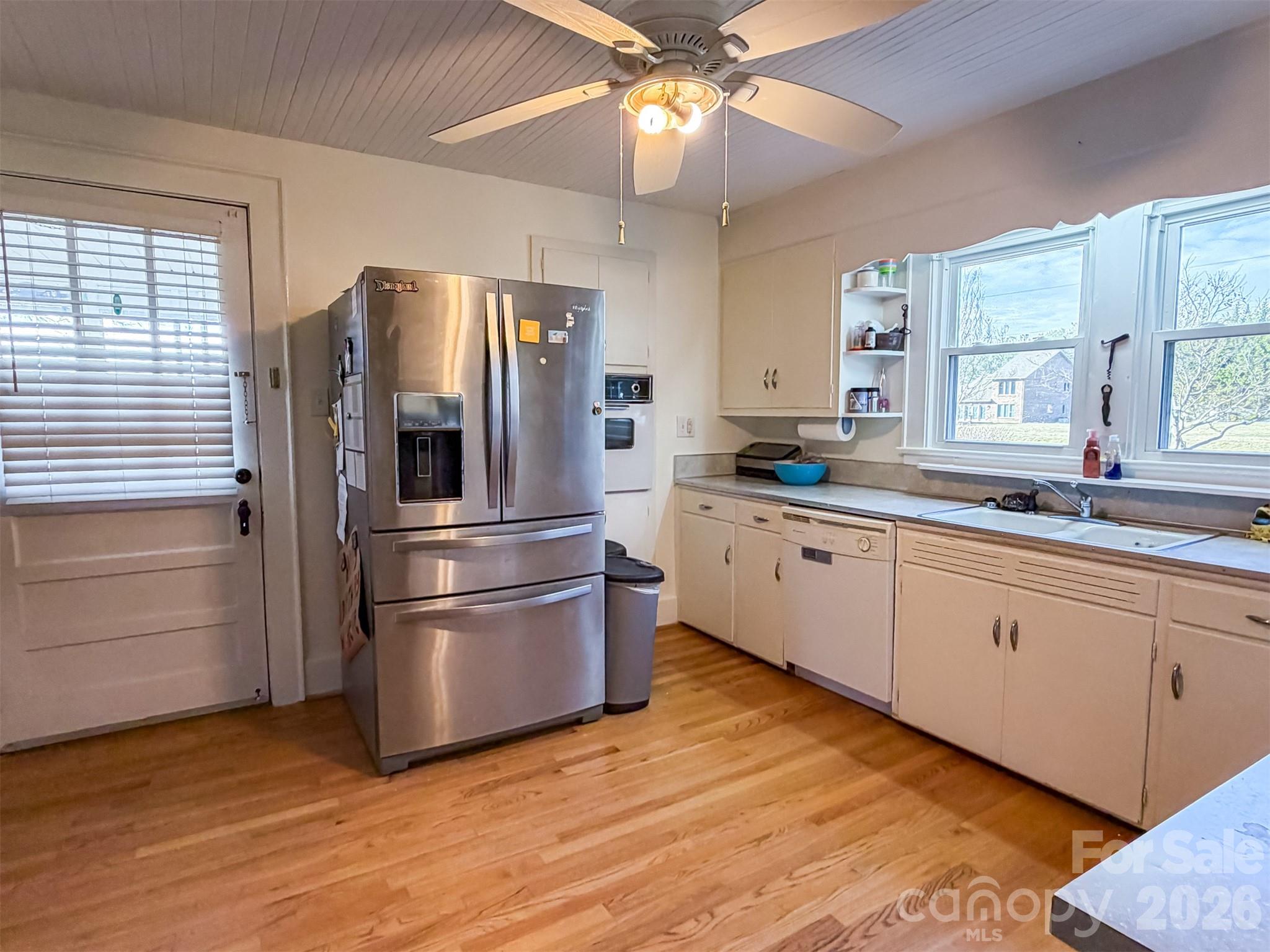 4363 Section House Road Hickory, NC 28601 - Photo 14 of 48 a kitchen with stainless steel appliances a refrigerator sink and cabinets