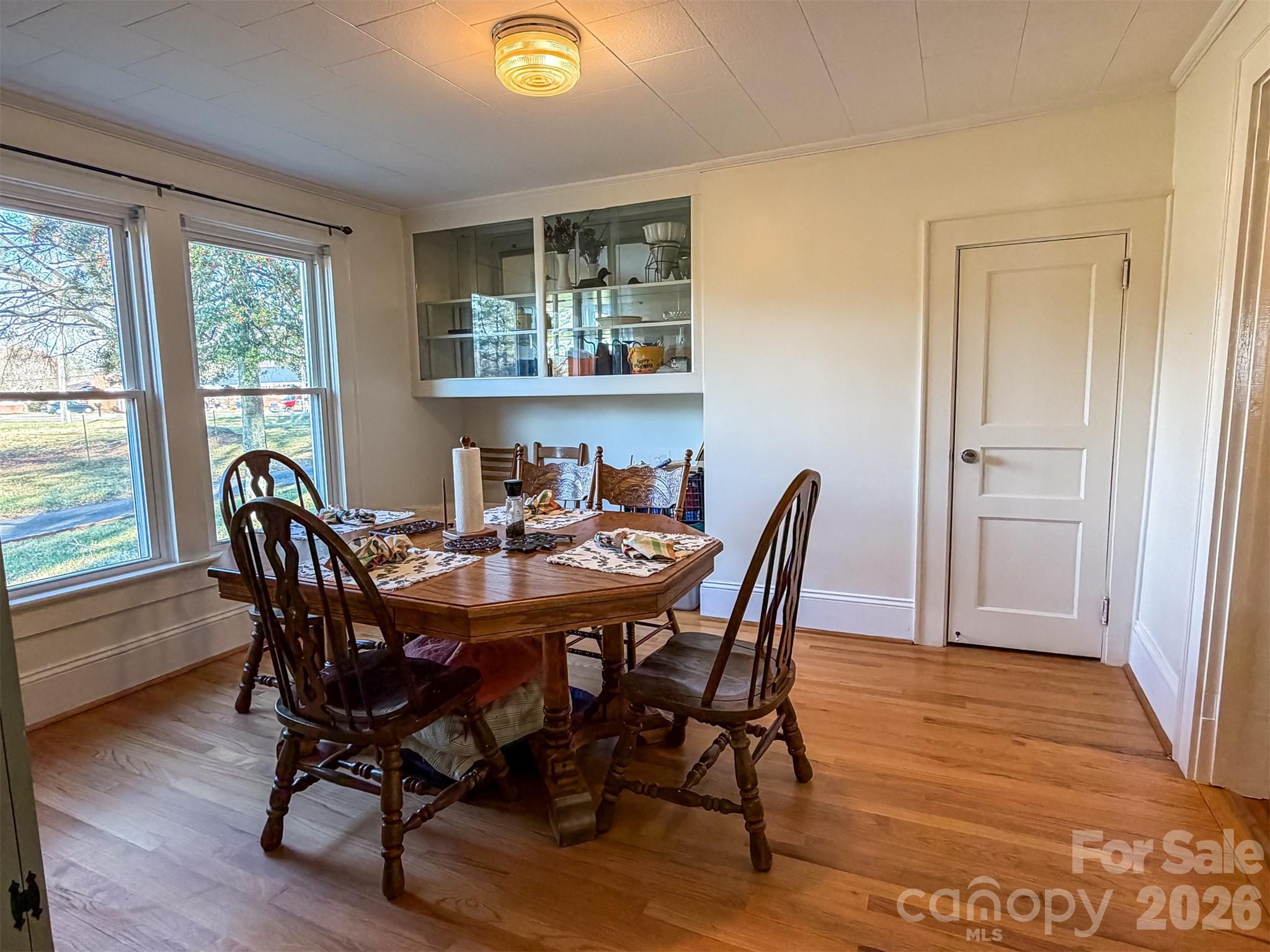 4363 Section House Road Hickory, NC 28601 - Photo 17 of 48 a view of a dining room with furniture and wooden floor