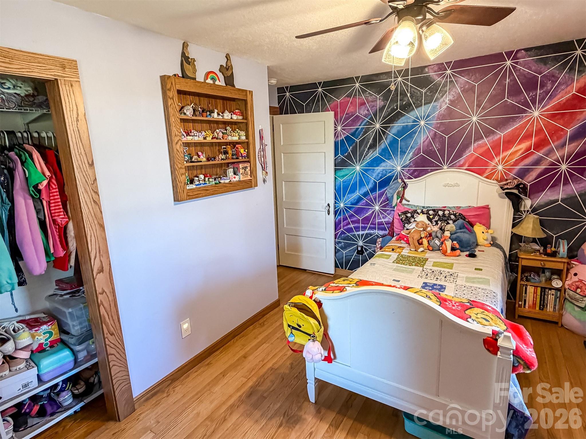 4363 Section House Road Hickory, NC 28601 - Photo 27 of 48 a view of walk in closet with clothes and shoes