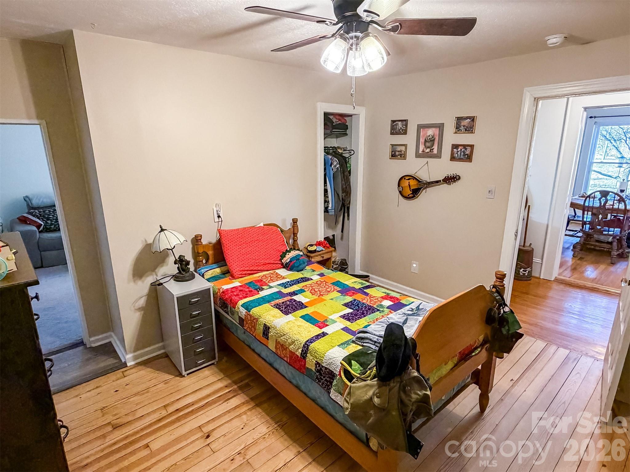4363 Section House Road Hickory, NC 28601 - Photo 30 of 48 a bedroom with a bed and wooden floor