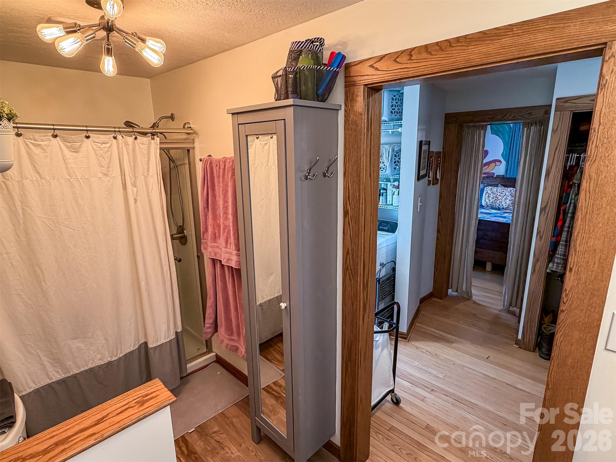 4363 Section House Road Hickory, NC 28601 - Photo 37 of 48 a view of a hallway with wooden floor and staircase