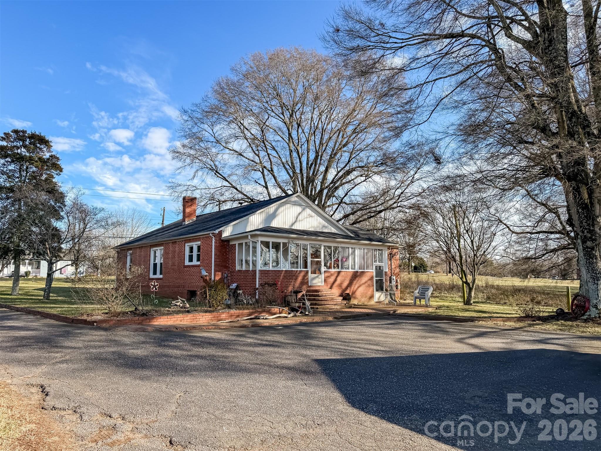 4363 Section House Road Hickory, NC 28601 - Photo 7 of 48 a front view of a building with trees