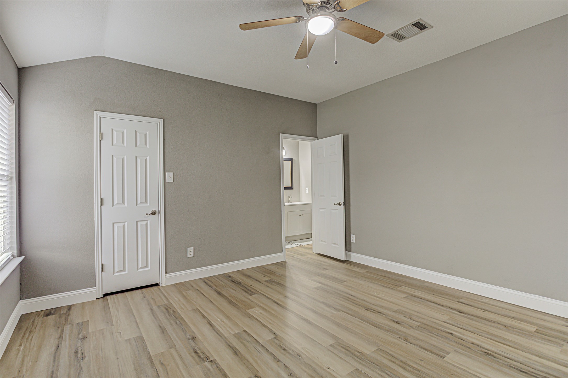 17838 Loch Linnhe Loop Pflugerville, TX 78660 - Photo 14 of 35 a view of an empty room with wooden floor