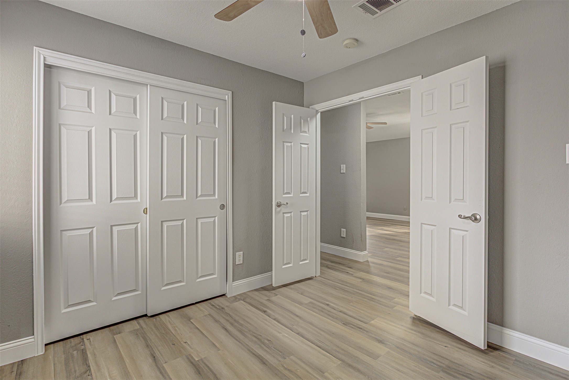 17838 Loch Linnhe Loop Pflugerville, TX 78660 - Photo 19 of 35 a view of empty room with wooden floor