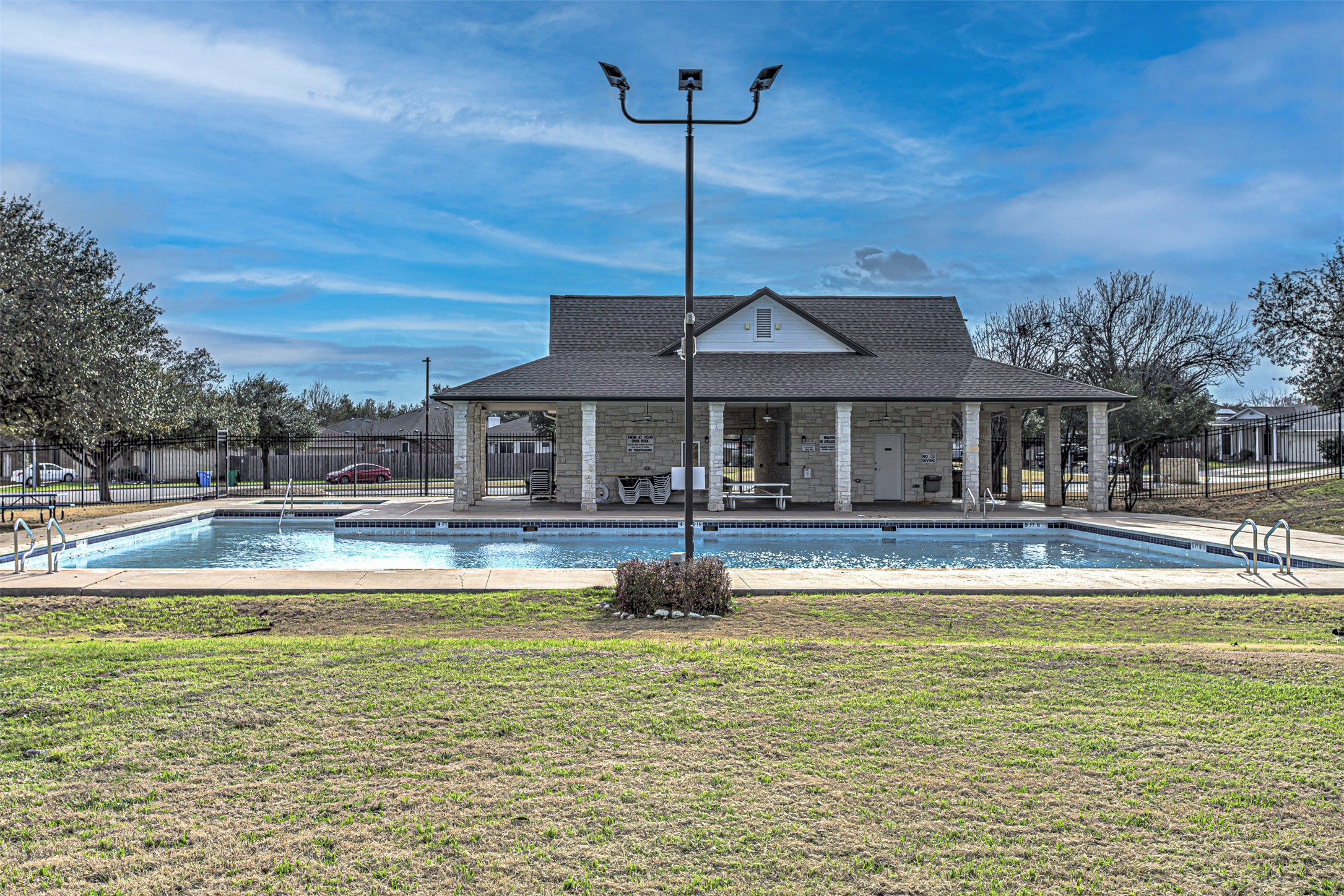 17838 Loch Linnhe Loop Pflugerville, TX 78660 - Photo 30 of 35 a swimming pool with outdoor seating