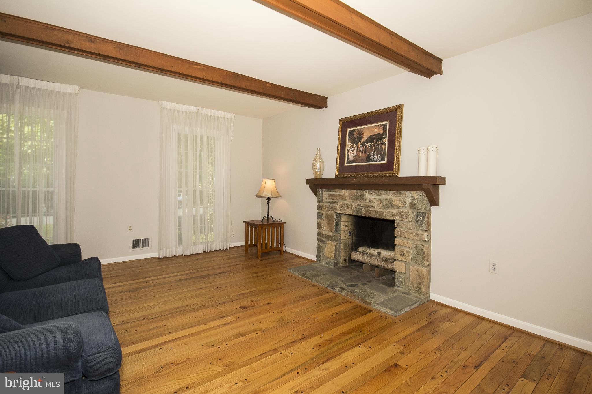 1609 Chester Mill Road Silver Spring, MD 20906 - Photo 11 of 27 Family Room with Hardwood Flooring