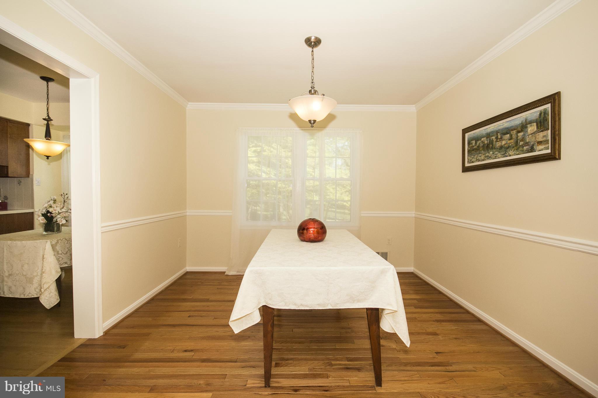 1609 Chester Mill Road Silver Spring, MD 20906 - Photo 7 of 27 Dining Room with Hardwood Flooring