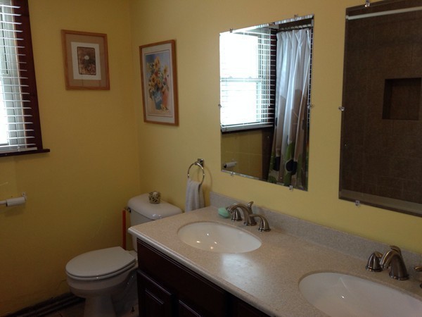45 Sassawanna Road Rutland, MA 01543 - Photo 17 of 27 a bathroom with a granite countertop toilet sink and mirror