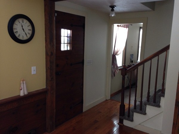 45 Sassawanna Road Rutland, MA 01543 - Photo 5 of 27 a view of a hallway with wooden door